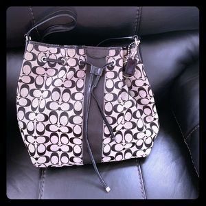 Black COACH Signature Drawstring Bag